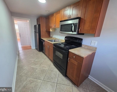 7701 Gilbert Street - Photo Thumbnail 1