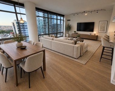 100 E 14th Street - Photo Thumbnail 3
