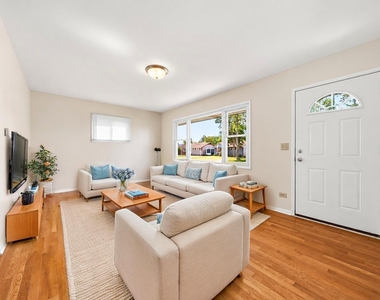 14229 S Blaine Avenue - Photo Thumbnail 1
