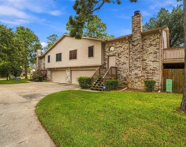 7744 Champion Pines Drive - Photo Thumbnail 1
