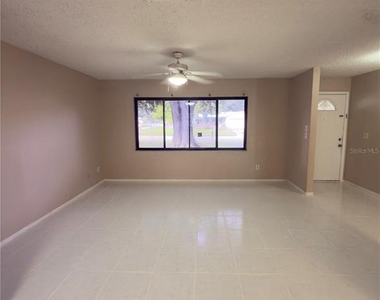 11001 Longhill Drive N - Photo Thumbnail 4