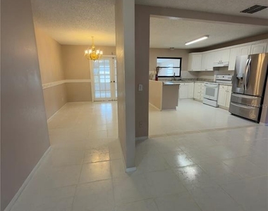 11001 Longhill Drive N - Photo Thumbnail 5