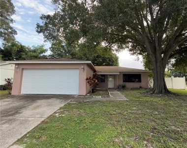11001 Longhill Drive N - Photo Thumbnail 1