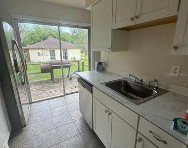 4153 Se 21st Court - Photo Thumbnail 2