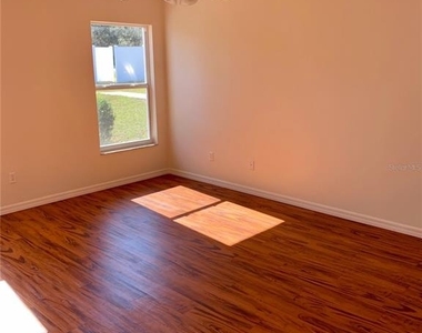 16400 Coopers Hawk Avenue - Photo Thumbnail 3