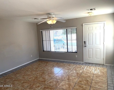 12718 W Willow Avenue - Photo Thumbnail 3
