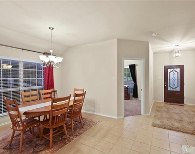 9609 Sand Trap Drive - Photo Thumbnail 1