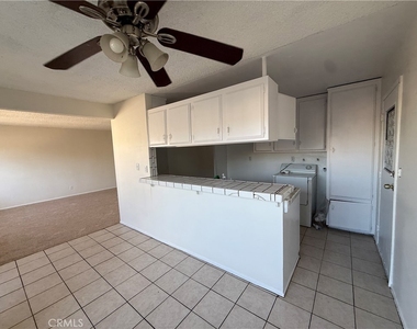 4910 E 4th Street - Photo Thumbnail 3