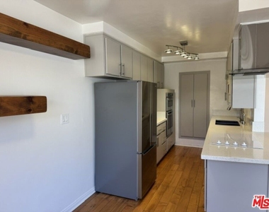 8710 Delgany Avenue - Photo Thumbnail 3