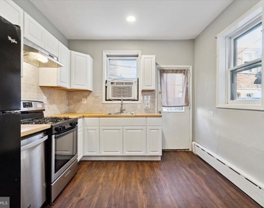 1547 S Newkirk Street - Photo Thumbnail 5
