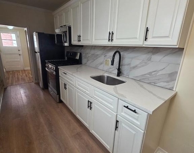 1137 Buttonwood Street - Photo Thumbnail 4