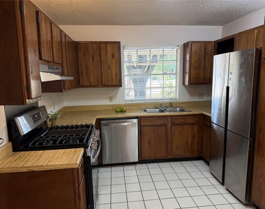 7708 Brodie Ln - Photo Thumbnail 1