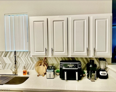 6955 N Durango Drive - Photo Thumbnail 3