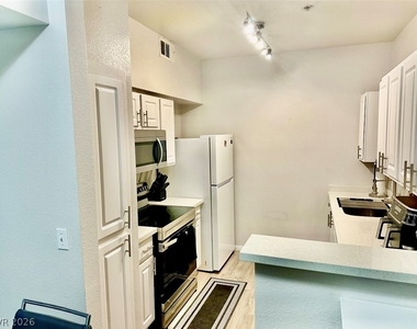6955 N Durango Drive - Photo Thumbnail 2