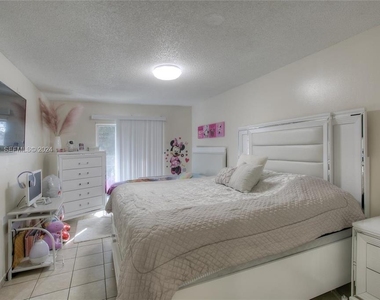 5665 W 20th Avenue - Photo Thumbnail 5