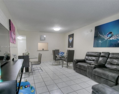 5665 W 20th Avenue - Photo Thumbnail 2