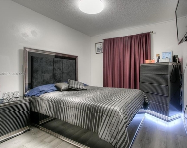 5665 W 20th Avenue - Photo Thumbnail 3
