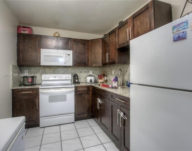 5665 W 20th Avenue - Photo Thumbnail 1