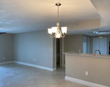 5061 Wiles Road - Photo Thumbnail 3