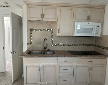 4447 Orchard Street - Photo Thumbnail 2