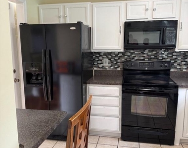 9514 Washington Avenue - Photo Thumbnail 5