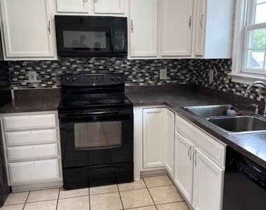 9514 Washington Avenue - Photo Thumbnail 6