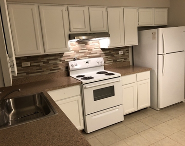 1211 Whispering Hills Court - Photo Thumbnail 1