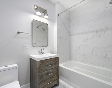 825 E 61st Street - Photo Thumbnail 8