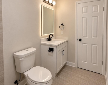 8828 Curry Road - Photo Thumbnail 3