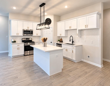 8828 Curry Road - Photo Thumbnail 1