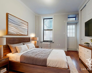 210 East 25th Street - Photo Thumbnail 1
