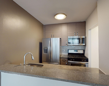 401 E 34th St - Photo Thumbnail 1