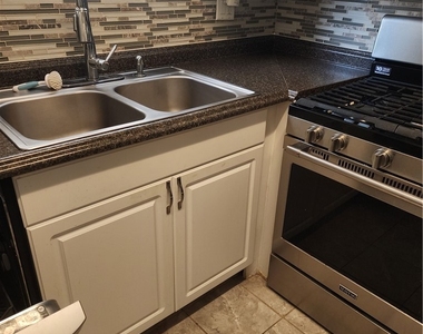 2307 Bensonia Avenue - Photo Thumbnail 2