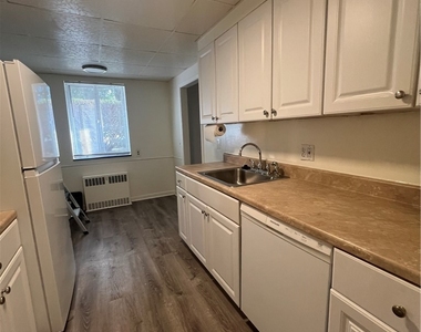 1077 East Avenue - Photo Thumbnail 6