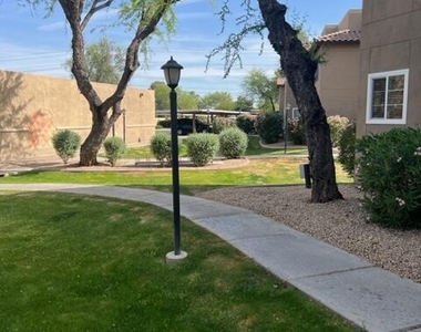 9451 E Becker Lane - Photo Thumbnail 2