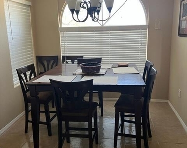 9451 E Becker Lane - Photo Thumbnail 4