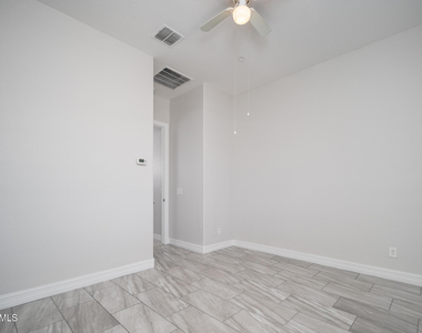 9752 W Rowel Road - Photo Thumbnail 29