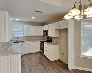 7732 Pear Tree Lane - Photo Thumbnail 3