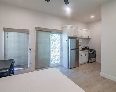 1419 S Curson Avenue - Photo Thumbnail 1