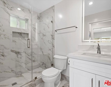 1165 Stanford St - Photo Thumbnail 3