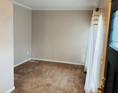8643 Adrienne Place - Photo Thumbnail 2