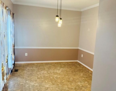 8643 Adrienne Place - Photo Thumbnail 3