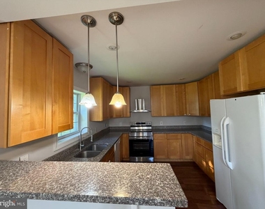 7124 Quincy Avenue - Photo Thumbnail 3
