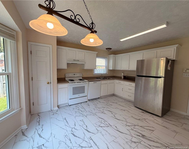 7229 Tollhouse Drive - Photo Thumbnail 4