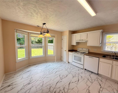 7229 Tollhouse Drive - Photo Thumbnail 3