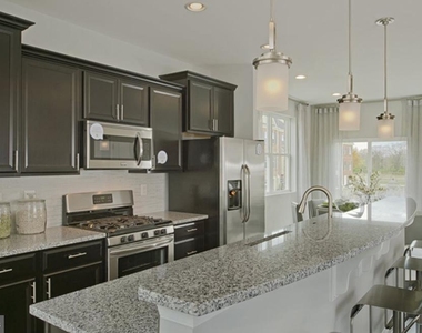 7155 Macon Street - Photo Thumbnail 7