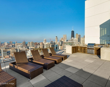 303 W Ohio Street - Photo Thumbnail 2