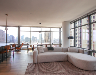 100 E 14th Street - Photo Thumbnail 2