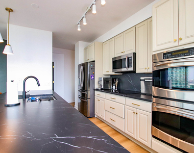 100 E 14th Street - Photo Thumbnail 9