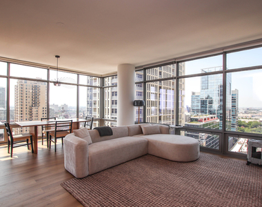 100 E 14th Street - Photo Thumbnail 1